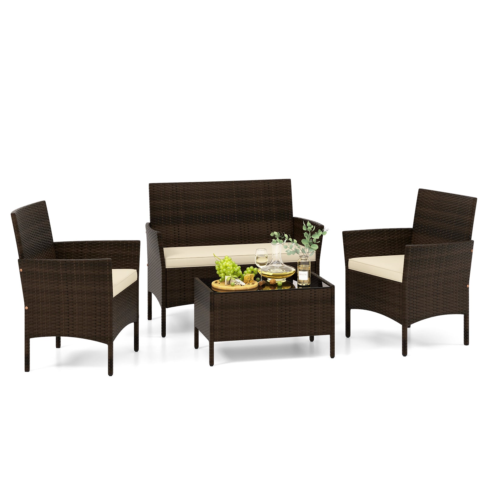 4-Piece Beige Patio Rattan Conversation Set with Cushions, Glass Table & Ergonomic Design arranged elegantly, showcasing the plush cushions and glass-topped table.