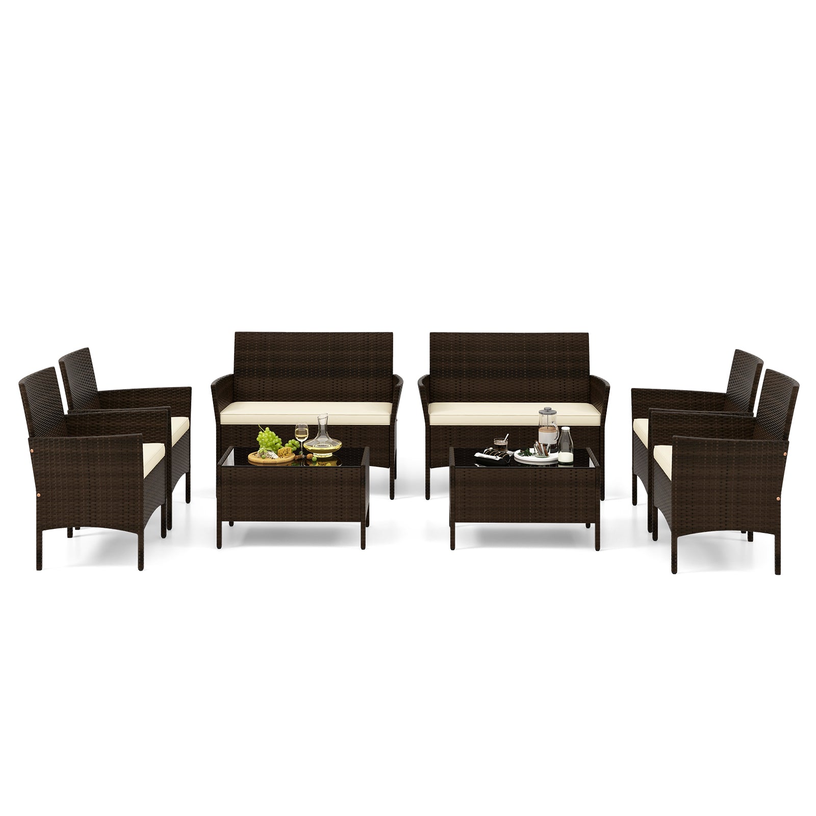 4-Piece Beige Patio Rattan Conversation Set with Cushions, Glass Table & Ergonomic Design arranged for entertaining, featuring drinks and snacks on the table.