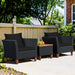 3-Piece Black Rattan Patio Furniture Set with Plush Cushions & Rustic Wood Coffee Table placed in a backyard, ideal for relaxation.