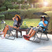 Couple relaxing on the Folding Recliner Lounge Chair with Adjustable Shade Canopy & Cup Holder by Dream Yard Oasis, perfect for outdoor enjoyment.
