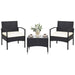 Elegant arrangement of the 3-Piece Patio Wicker Rattan Furniture Set with decorative items on the glass table, enhancing outdoor aesthetics.