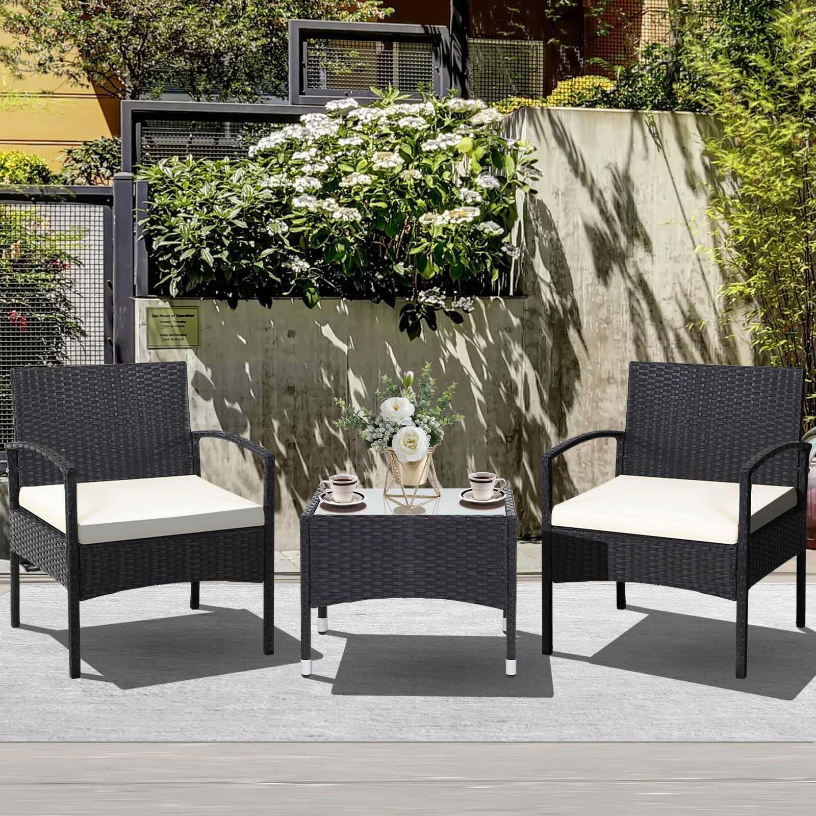 Beautiful outdoor setting with a 3-Piece Patio Wicker Rattan Furniture Set featuring plush cushions and a chic glass table, ideal for lawns and backyards.