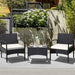 Beautiful outdoor setting with a 3-Piece Patio Wicker Rattan Furniture Set featuring plush cushions and a chic glass table, ideal for lawns and backyards.