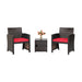 3-Piece Red Patio Wicker Furniture Set displaying two black wicker chairs with red cushions and a coffee table, adorned with flowers, creating a cozy outdoor vibe.