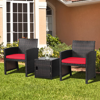 3-Piece Red Patio Wicker Furniture Set featuring comfortable black wicker chairs with red cushions and a stylish storage coffee table, perfect for outdoor relaxation.