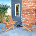 Eucalyptus Foldable Outdoor Adirondack Chair set around a fire pit on a stylish patio. Perfect for relaxation in your garden or deck.