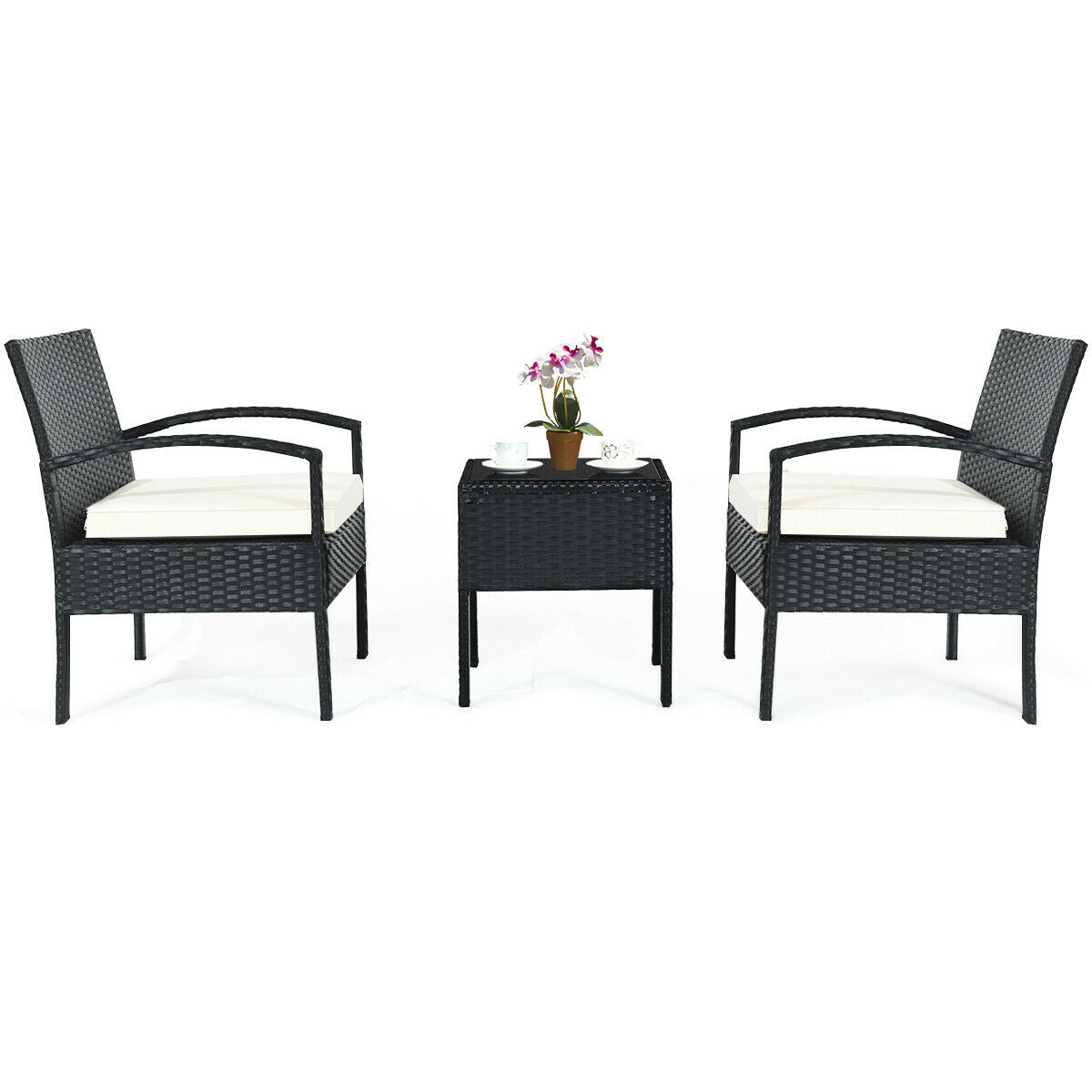 Another angle of the 3 Piece Outdoor Rattan Sofa Set with Cushions and Glass Table for Patio and Garden, displaying chairs and a centerpiece plant for a fresh look.