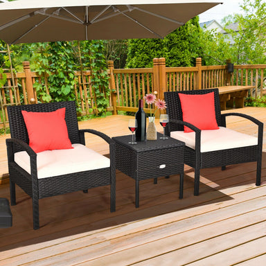 3 Piece PE Rattan Wicker Sofa Set with Washable Cushions & Coffee Table for Outdoor Patio, featuring two stylish chairs with coral accent cushions and a matching coffee table, set against a serene outdoor patio backdrop.