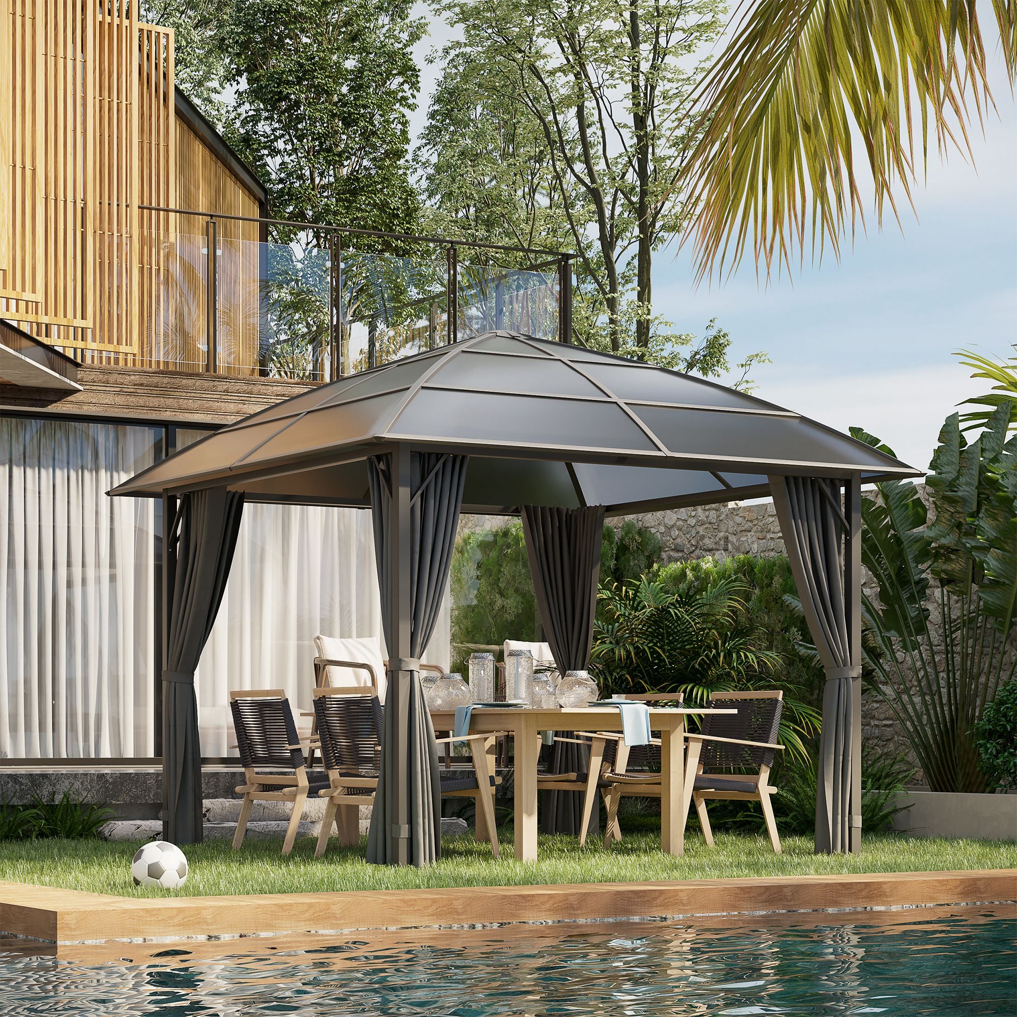 The 10'x10' Outsunny Hardtop Gazebo set up in a backyard with a dining table, creating an inviting outdoor space for gatherings.