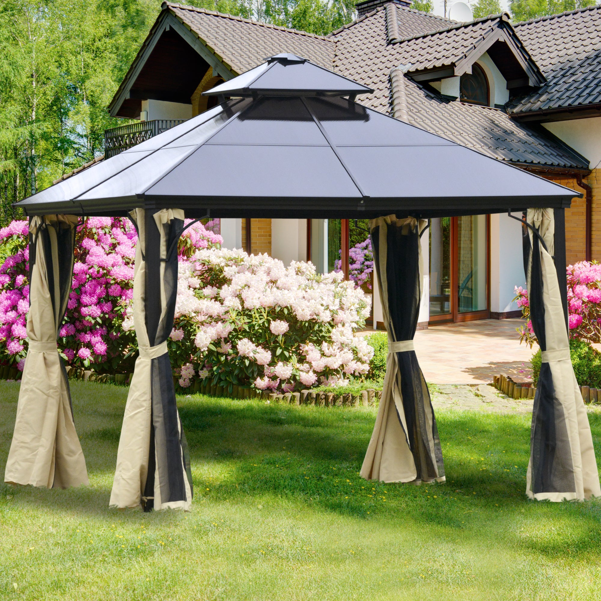 Outsunny 10' x 10' Metal Hardtop Gazebo Canopy with Polycarbonate Roof showcased in a garden setting, featuring elegant curtains and vibrant flowers in the background.