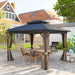 The Outsunny 10' x 12' Hardtop Patio Gazebo elegantly displayed in a backyard setting with comfortable seating and hanging curtains.
