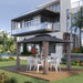 The Outsunny 12' x 10' Double Roof Hardtop Gazebo set up in a stylish outdoor space with white chairs and table, surrounded by greenery near a modern house.