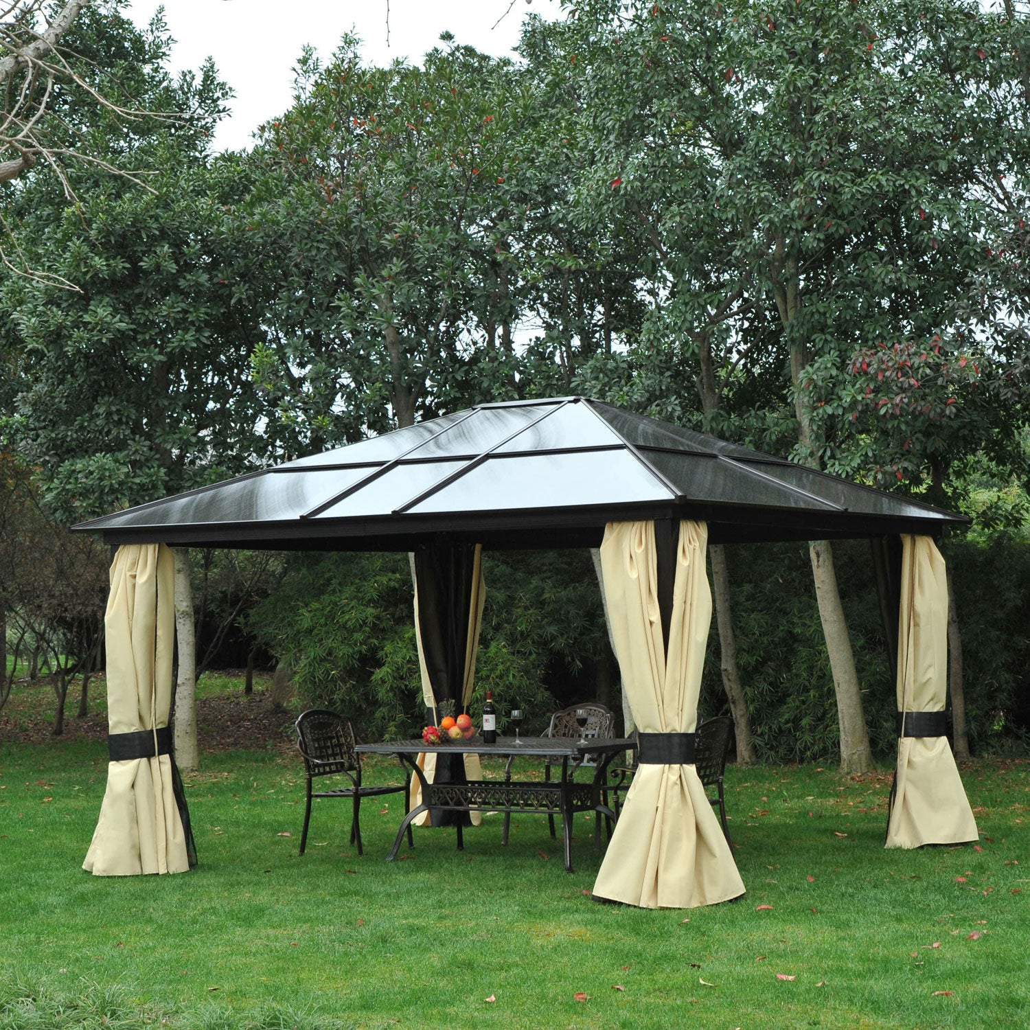 The Outsunny 14'x12' Aluminum Patio Gazebo Canopy set in a garden with a dining table showing its perfect outdoor functionality.