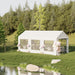 The Outsunny 20' x 10' Outdoor Party Tent Canopy beautifully set up in a scenic outdoor environment with decoration, perfect for events.
