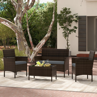 4-Piece Gray Patio Rattan Conversation Set with Comfortable Cushions & Sturdy Design, featuring stylish chairs and a coffee table set in a lush outdoor setting.