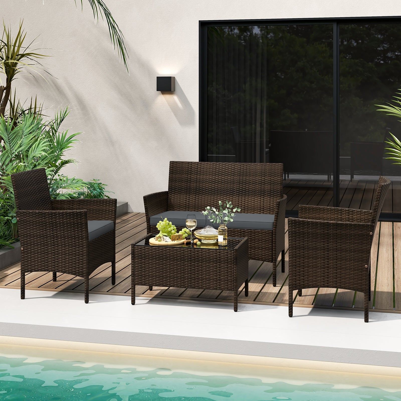 4-Piece Gray Patio Rattan Conversation Set displayed on a modern patio by a pool, inviting outdoor relaxation.