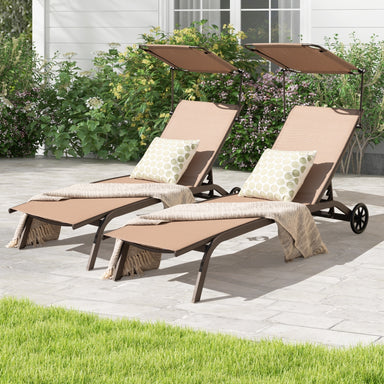 Two Heavy-Duty Adjustable Chaise Lounge Chairs with Canopies & Cup Holders in brown, set in a garden area with lush greenery, ideal for sunbathing and outdoor comfort.