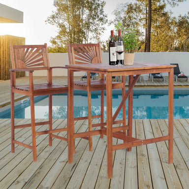 3-Piece Acacia Wood Patio Bar Set with Sunflower Backrest featuring a stylish table and comfortable stools by Dream Yard Oasis, perfect for outdoor gatherings next to a pool.