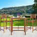 3-Piece Acacia Wood Patio Bar Set with Sunflower Backrest featuring a stylish bar table and two stools on a patio with a scenic view.