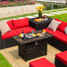 42-Inch Propane Fire Pit Table set on a patio, highlighted by red cushions and refreshments, illustrating its dual purpose as a chic coffee table with a 50,000 BTU heat output.