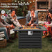 Group of friends enjoying a cozy evening around the Dream Yard Oasis™ 42-Inch Propane Fire Pit Table, featuring a 50,000 BTU heat output.