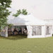 Guests enjoying an event inside the High Peak Decagonal Party Tent by Dream Yard Oasis™, featuring ample space and inviting design for gatherings.